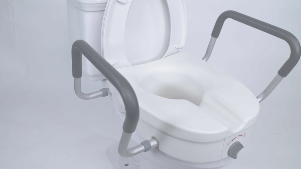 elevated toilet seat with padded armrests